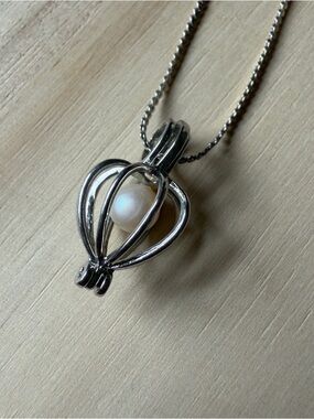 Gold Plated Pearl Cage Pendant Necklace